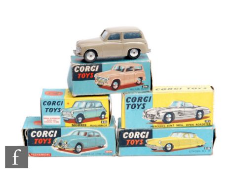 A group of Corgi diecast model cars, 303 Mercedes-Benz 300SL Open Roadster in white with blue interior and flat spun hubs, 20