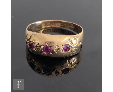 An early 20th Century five stone ruby and diamond boat shape ring with alternating gypsy set stones, Birmingham 1905, weight 