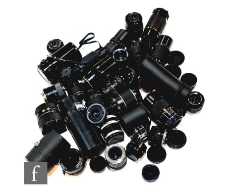 A large collection of camera lenses, various formats and ranges, makers include Chinon, Praktica, Kiron, Sigma, Minolta, Heli