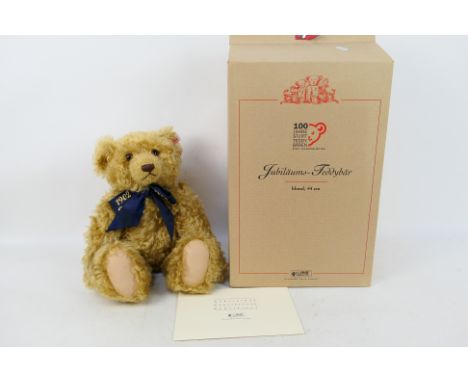 Steiff - A limited edition boxed 2002 Steiff 'Centenary Teddy Bear' - The #670985 blonde bear has white buttoned Steiff label