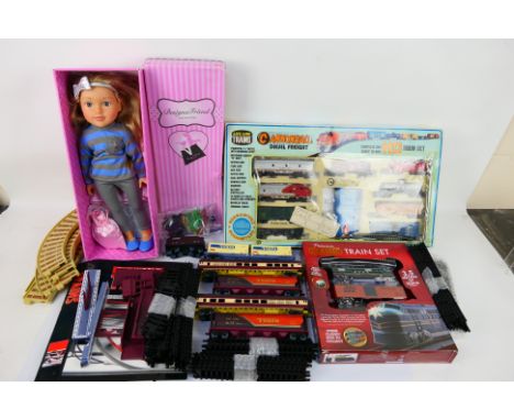 Chad Valley - Life Like Trains - A boxed Designa Friend 18" doll with accessories, appears Mint in a Fair box and a HO gauge 