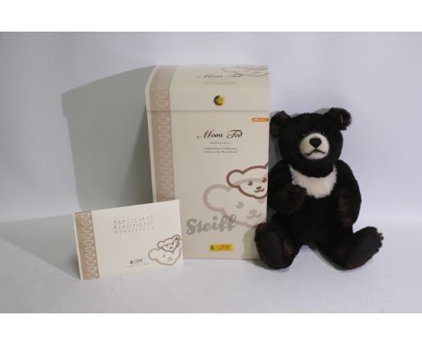 Steiff - A limited edition boxed dark brown Steiff teddy bear - The #662423 'Moon Ted' bear has white buttoned Steiff label o