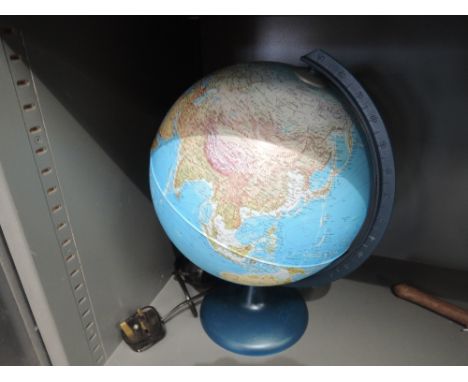 A vintage light up globe of the worldCONDITION REPORT - no major damage visible, in good general condition 
