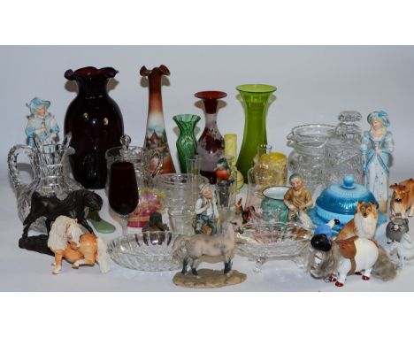 A collection of early 20th century and later glassware to include vaseline vases, cranberry flower vases, cut glass water jug