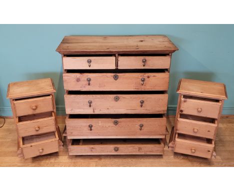 A 19th century pine chest of two short over three long drawers, with brass swing handles, raised on detachable plinth base, r