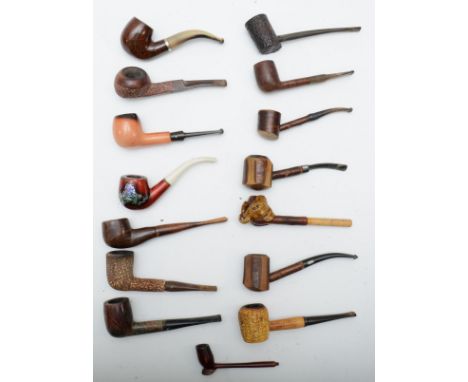 Fifteen tobacco pipes to include a Ropp De Luxe French example, and a elephant bowl pipe. 