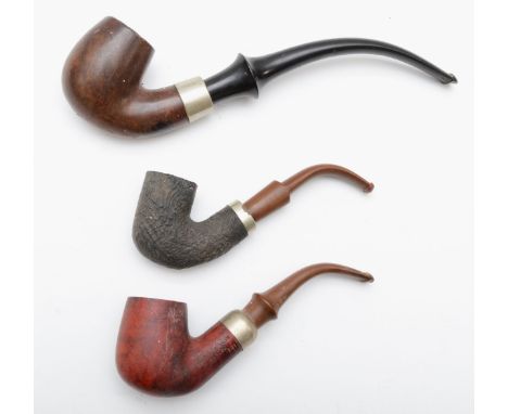 Three plain tobacco pipes to include a USA Ellington example, 25cm, and an Irish Reject pipe. 