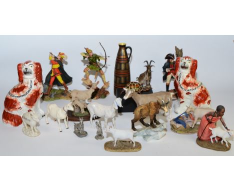 Royal Doulton; three sculptures comprising of Dick Turpin, Pied Piper and Robin Hood together with a pair a of Staffordshire 