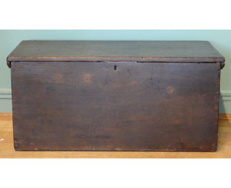 A 19th/early 20th century stained pine tapering twin handled travelling trunk, the hinged lid opening to reveal the name Thom