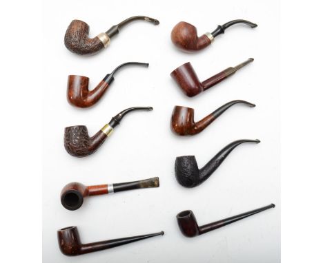 Ten tobacco pipes to include a Petersons silver collared example, and a Dr. Grabow Omega briar Pipe. 