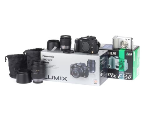 A Panasonic G2W Micro Four Thirds Digital Mirrorless Camera,body G-VG, together with a Lumix 14-42mm lens, battery, charger, 