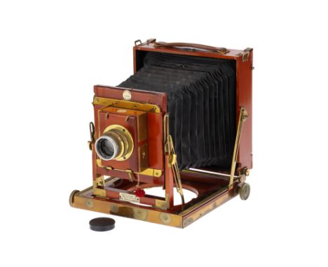 A Thornton-Pickard 'Imperial Perfecta' Half Plate Mahogany Field Camera,body G, some damage to one corner, the camera can sti