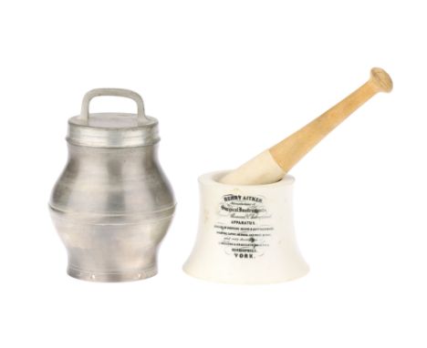 A Double Mortar and Pestle by Henry Aitken, English, late 19th century, the ceramic mortar advertising their surgical, chemic