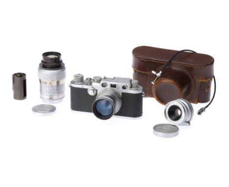 A Leica IIIf Rangefinder Camera Outfit,chrome, serial no. 609355, with Leitz lenses including Leitz Summar f/2 50mm, Leitz Su