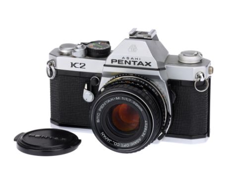 An Asahi Pentax K2 SLR Camera,chrome, with SMC Pentax-M f/1.7 50mm lens, body, G, shutter working but slow speeds untested, F