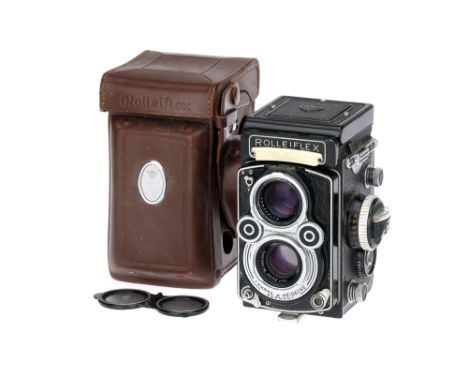 A Rollei Rolleiflex 3.5F TLR Medium Format Camera,black, serial no. 2235980, with Carl Zeiss Planar f/3.5 75mm lens, serial n