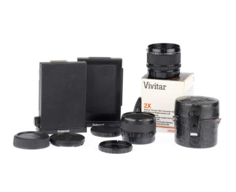 A Selection of Medium Format Camera Accessories,to include a 2x teleconverter by Komura for Hasselblad, also with a 2x Teleco