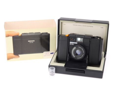 A Minox 35ML Compact Camera,with Color-Minotar f/2.8 35mm lens, body, VG, shutter untested, lens, VG-E, in maker's box