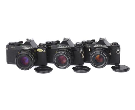 Three Asahi Pentax SLR Cameras,all black, including Pentax MV (2) and Pentax ME Super, all with Asahi Pentax 50mm standard le