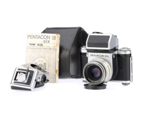 A Pentacon Six Medium Format SLR Camera,body G, working shutter, with a metered pentaprism, body G, slight haze to mirror, re