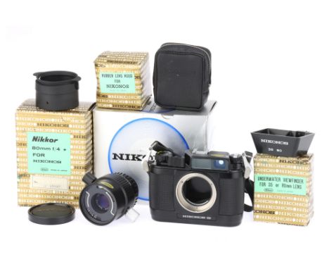 A Nikon Nikonos III 35mm Underwater Viewfinder Camera,black, body G-VG, shutter working, with Nikkor f/4 80mm lens, body VG-E