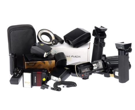 A Selection of Olympus Camera Accessories,to include an Olympus T10 Ring Flash, an OM Series Electronic Flash T-20, an Olympu