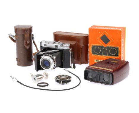 A Balda Super Baldax Medium Format Rangefinder Camera,body G, shutter working, optics F, some haze present, also with an empt