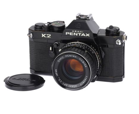 An Asahi Pentax K2 SLR Camera,black, with SMC Pentax f/1.8 55mm lens, body, G, shutter fires but slow speeds untested, lens, 