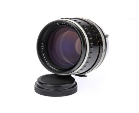 A Carl Zeiss Jena 180mm f/2.8 Sonnar Camera Lens,&nbsp;Pentacon Six mount, black, body G, optics G-VG, some light dust presen