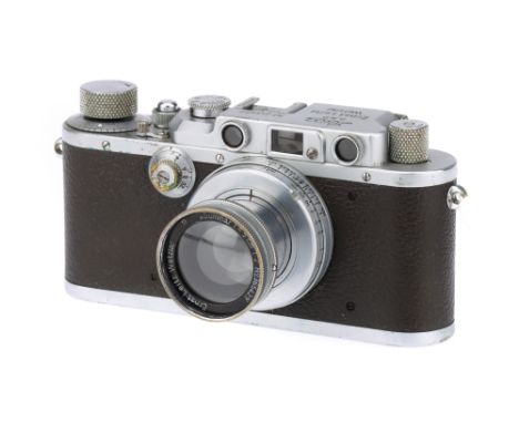 A Leica IIIa Rangefinder Camera,chrome, serial no. 245077, with Leitz Summar f/2 50mm lens, chrome, serial no. 365429, body, 