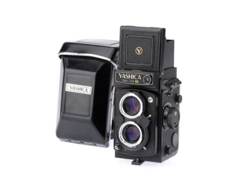 A Yashica Mat 124 G Medium Format TLR Camera,black, body G-VG, shutter working, optics G, some small &amp; light fungal bloom