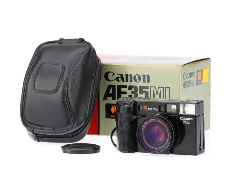 A Canon AF35 ML 35mm Compact Camera,black, body G, some sticker residue to top plate, with Canon f/1.9 40mm lens, optics G-VG