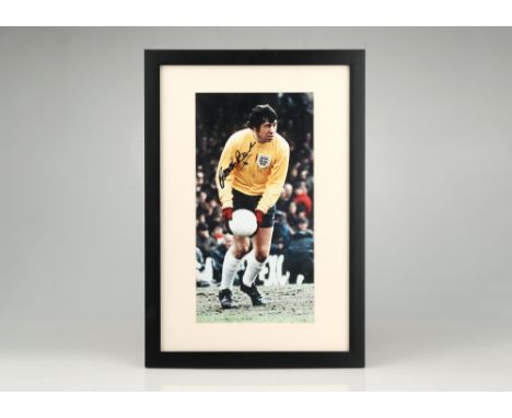 Gordon Banks (1937-2019)A signed photographic poster of the former England 1966 Football World Cup goalkeeper, dressed in yel