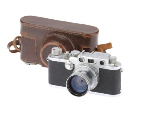 A Leitz Wetzlar Leica IIIf Rangefinder Camera1951-52, chrome, black dial, serial no. 599580, with a Leitz Wetzlar Summitar co