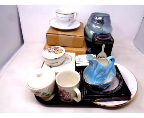 A tray of assorted ceramics to include four Queen Elizabeth golden jubilee teacups and saucers, Maling vase, milk jug and sug