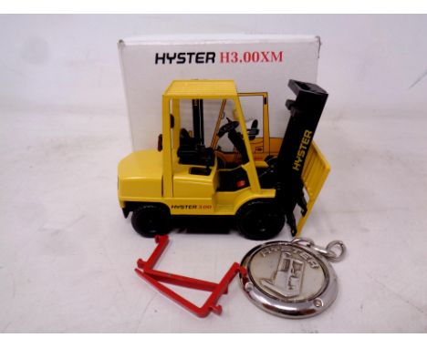 A Hyster H3.00XM scale model forklift truck with key ring, boxed 