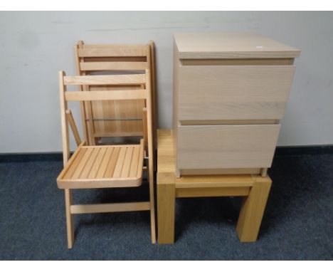 Three folding kitchen chairs, Ikea lamp table and a bedside chest 