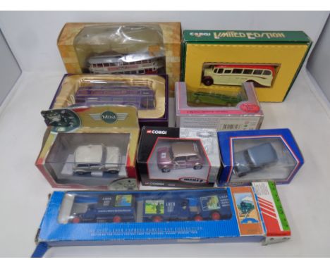 A box of boxed die cast vehicles - First Edition bus, Corgi Queen II Jubilee bus, etc 