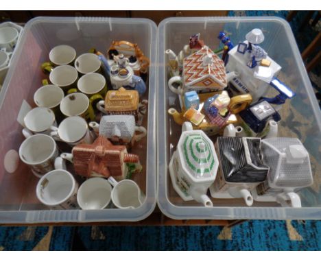 Two crates of novelty teapots : Ringtons, mugs, floral trellis, milk jug and sugar basin 