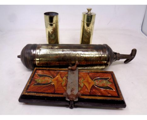 A box of vintage Pyrene fire extinguisher, wooden press, together with two WWI trench art ammunition shells 