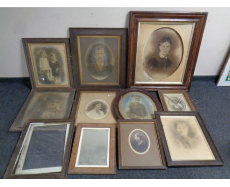 Eleven antique frames of colour and monochrome photographs, portrait study, soldier, framed mirror etc 