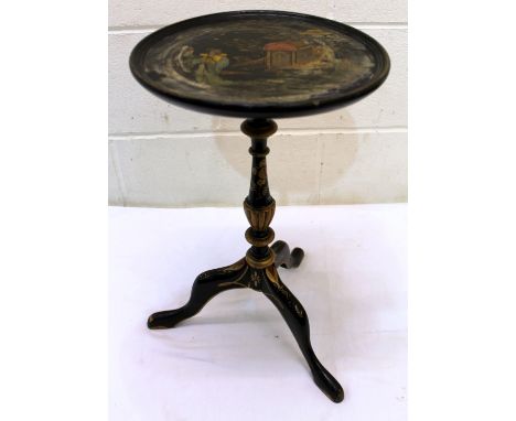 Chinese black lacquered circular wine table with gilt chinoiserie decoration on three splayed feet. 52cm high x 29cm diameter