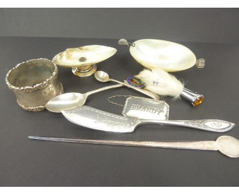 Silver napkin ring, a pair of filigree mounted pearl salts, a wine label and five other items.