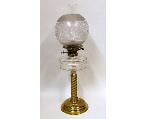Victorian / Edwardian oil lamp, the faceted clear glass reservoir on spiral twist column and domed base with clear etched gla