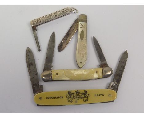 Silver pen knife, engraved, a similar fruit knife, mother of pearl and three others.