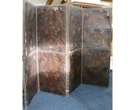 19th century four-fold pressed leather dressing screen, each panel decorated with painted floral and scroll design, 208cm x 2