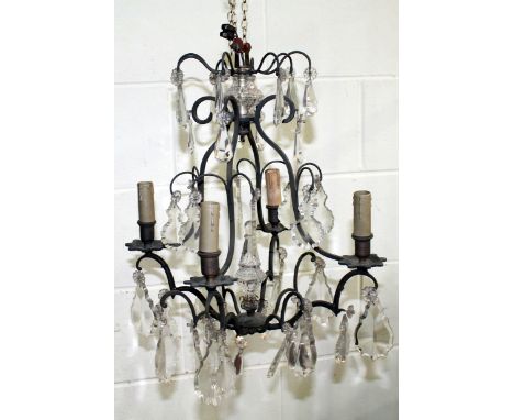 Antique chandelier, the wrought metal four sconce frame with multiple cut-glass lustre drops of teardrop form, 43cm high.