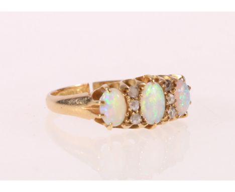 18ct gold opal and diamond ring, size L, ring clipped.