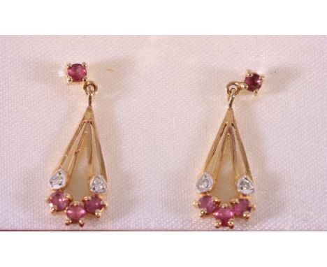 Pair of 9ct gold ruby and diamond pendant earrings, 1.5g.