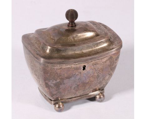 White metal tea caddy of boat shape with reeded rims raised on four ball supports, stamped to base Diemont, JCH star within a